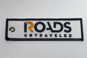 Roads Untraveled Key Tag